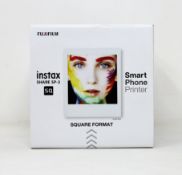 A boxed as new Fujifilm Instax SP-3 Share Square Wireless Photo Printer in White.