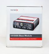 A boxed as new Vector VX1000 Measurement & Calibration Interface Base Module (Box opened).