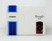 A boxed as new Olympus Tough TG-6 Digital Camera in Red (UK plug included).
