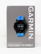 A boxed a new Garmin Forerunner 945 GPS Multisport Watch Bundle in Blue & Slate (Box sealed).