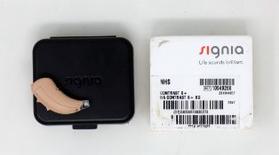 An as new Signia Contrast S+ Hearing Aid in Beige (REF: 10949268).