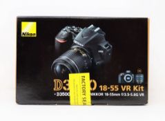 A boxed as new Nikon D3500 DSLR Camera & AF-P DX 18-55mm VR Lens (Box opened) (Two pin plugs