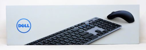 A boxed as new Dell Premier Wireless Keyboard and Mouse (P/N: KM717-GY-UK) (Box sealed).