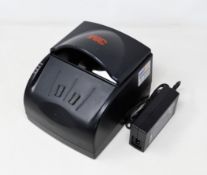 A pre-owned 3M AT9000 Passport/Full page ID Document Scanner (Power supply included).