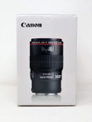 A boxed as new Canon EF 100mm f/2.8L IS USM Macro Lens.