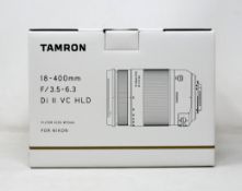 A boxed as new Tamron 18-400mm f3.5-6.3 Di II VC HLD Lens for Nikon (P/N: B028N).
