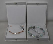 An as new Coeur De Lion Geo Cube Light Green Bracelet 4017/30-0520 (RRP £75) and an as new Coeur