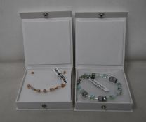 An as new Coeur De Lion Geo Cube Light Green Bracelet 4017/30-0520 (RRP £75) and an as new Coeur
