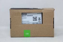 A boxed as new Loxone Dimmer Extension (Item no. 100029).