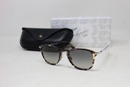 A pair of as new Persol Calligraphy Edition sunglasses.