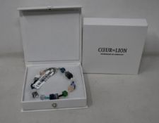 Two as new Coeur De Lion Blue Green Grey Mixed Geo Cube Bracelet 4905/30-0705 (RRP £95).