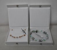 An as new Coeur De Lion Geo Cube Light Green Bracelet 4017/30-0520 (RRP £75) and an as new Coeur