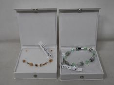 An as new Coeur De Lion Geo Cube Light Green Bracelet 4017/30-0520 (RRP £75) and an as new Coeur