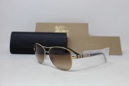 A pair of as new Burberry sunglasses.