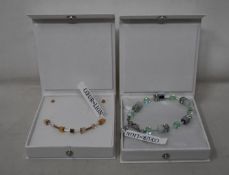An as new Coeur De Lion Geo Cube Light Green Bracelet 4017/30-0520 (RRP £75) and an as new Coeur