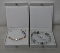 An as new Coeur De Lion Geo Cube Light Green Bracelet 4017/30-0520 (RRP £75) and an as new Coeur