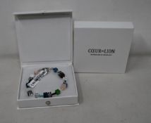 Two as new Coeur De Lion Blue Green Grey Mixed Geo Cube Bracelet 4905/30-0705 (RRP £95).