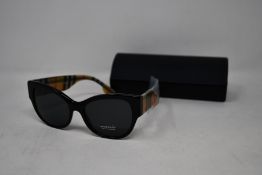 A pair of as new Burberry sunglasses.