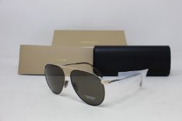 A pair of as new Burberry sunglasses.
