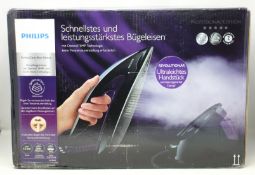 A boxed as new Philips PerfectCare Elite Silence steam generator iron.