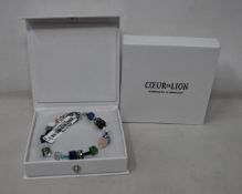 Two as new Coeur De Lion Blue Green Grey Mixed Geo Cube Bracelet 4905/30-0705 (RRP £95).