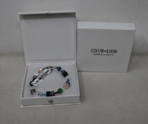 Two as new Coeur De Lion Blue Green Grey Mixed Geo Cube Bracelet 4905/30-0705 (RRP £95).