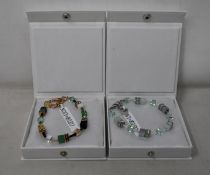 An as new Coeur De Lion Geo Cube Gree-Beige and Rose Bracelet 4905/30-0510 (RRP £95) and an as new