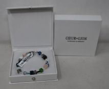 Two as new Coeur De Lion Blue Green Grey Mixed Geo Cube Bracelet 4905/30-0705 (RRP £95).