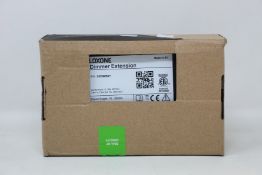 A boxed as new Loxone Dimmer Extension (Item no. 100029).