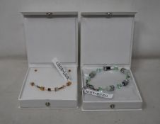 An as new Coeur De Lion Geo Cube Light Green Bracelet 4017/30-0520 (RRP £75) and an as new Coeur
