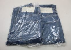 Two pairs of as new Agolde Riley jeans (Size 27).