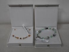 An as new Coeur De Lion Geo Cube Light Green Bracelet 4017/30-0520 (RRP £75) and an as new Coeur