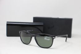 A pair of as new Persol sunglasses.