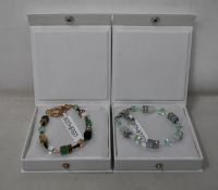 An as new Coeur De Lion Geo Cube Gree-Beige and Rose Bracelet 4905/30-0510 (RRP £95) and an as new