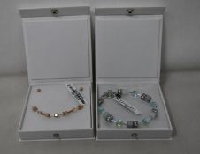 An as new Coeur De Lion Geo Cube Light Green Bracelet 4017/30-0520 (RRP £75) and an as new Coeur