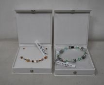 An as new Coeur De Lion Geo Cube Light Green Bracelet 4017/30-0520 (RRP £75) and an as new Coeur