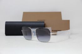 A pair of as new Burberry sunglasses.