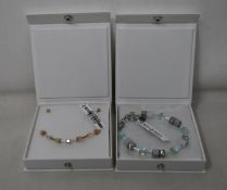 An as new Coeur De Lion Geo Cube Light Green Bracelet 4017/30-0520 (RRP £75) and an as new Coeur