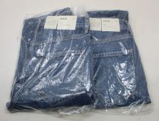 Two pairs of as new Agolde Riley jeans (Size 27).