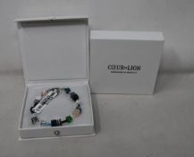 Two as new Coeur De Lion Blue Green Grey Mixed Geo Cube Bracelet 4905/30-0705 (RRP £95).