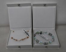 An as new Coeur De Lion Geo Cube Light Green Bracelet 4017/30-0520 (RRP £75) and an as new Coeur