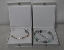 An as new Coeur De Lion Geo Cube Light Green Bracelet 4017/30-0520 (RRP £75) and an as new Coeur