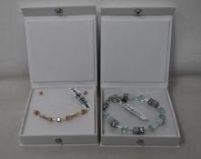 An as new Coeur De Lion Geo Cube Light Green Bracelet 4017/30-0520 (RRP £75) and an as new Coeur