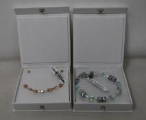 An as new Coeur De Lion Geo Cube Light Green Bracelet 4017/30-0520 (RRP £75) and an as new Coeur