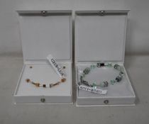 An as new Coeur De Lion Geo Cube Light Green Bracelet 4017/30-0520 (RRP £75) and an as new Coeur