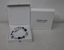 Two as new Coeur De Lion Blue Green Grey Mixed Geo Cube Bracelet 4905/30-0705 (RRP £95).