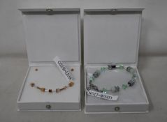 An as new Coeur De Lion Geo Cube Light Green Bracelet 4017/30-0520 (RRP £75) and an as new Coeur