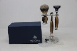 A boxed as new Truefitt & Hill Faux Horn Edwardian Shaving Set; Badger Brush, Mach III Razor and