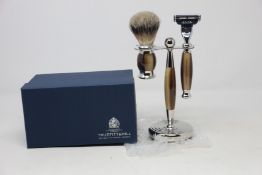 A boxed as new Truefitt & Hill Faux Horn Edwardian Shaving Set; Badger Brush, Mach III Razor and