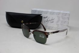 A pair of as new Persol Calligraphy Edition sunglasses.